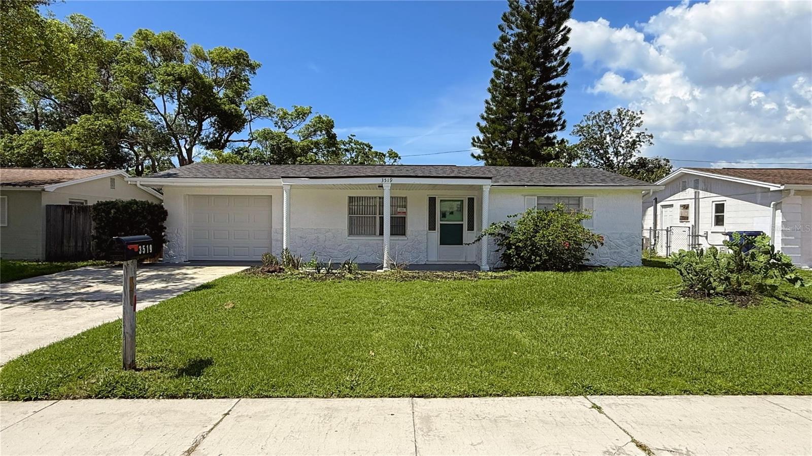 Welcome home to this 3 bedroom, 2 bath home that has many NEW features. Enjoy a NEW kitchen with cabinets, granite counter tops, lighting, fixtures and newer stainless appliances. Both baths have NEW vanities, lighting and fixtures. New Luxury Vinyl flooring throughout compliments the freshly painted interior. Exterior has been painted also. Roof installed in 2024, Water Heater in 2024, HVAC in 2018 and garage door in 2024. Conveniently located to US 19, Tarpon Springs Aquarium, the Gulf, J Ben Harrill Recreation Complex, shopping and restaurants.