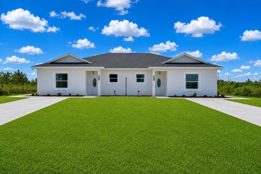 One or more photo(s) has been virtually staged. Spacious and stylish brand-new construction duplex available in beautiful Indian Lake Estates! Each 3-bedroom, 2-bath unit offers approximately 1,300 square feet of modern living space with an open-concept layout perfect for entertaining and everyday comfort. Enjoy a bright and airy living area, contemporary finishes, spacious bedrooms, and a thoughtfully designed floor plan. primary bedrooms have an extra vanity that can be used as seperate dressing areea with itown seperate sink and outlets for multiple accessories.The modern kitchen flows seamlessly into the dining and living areas, creating the perfect space for gatherings and relaxing at home. This newly built duplex also features updated fixtures, ample storage, and a large backyard area to enjoy Florida living.Located in the peaceful community of Indian Lake Estates, residents can enjoy a quiet setting while still being conveniently located near lakes, golf, boating, and outdoor recreation and Werstgate River Ranch. Move-in ready and perfect for families, professionals, or anyone looking for a fresh, modern home in a peaceful Florida community! Only pictures of the lawn have been virtually enhanced