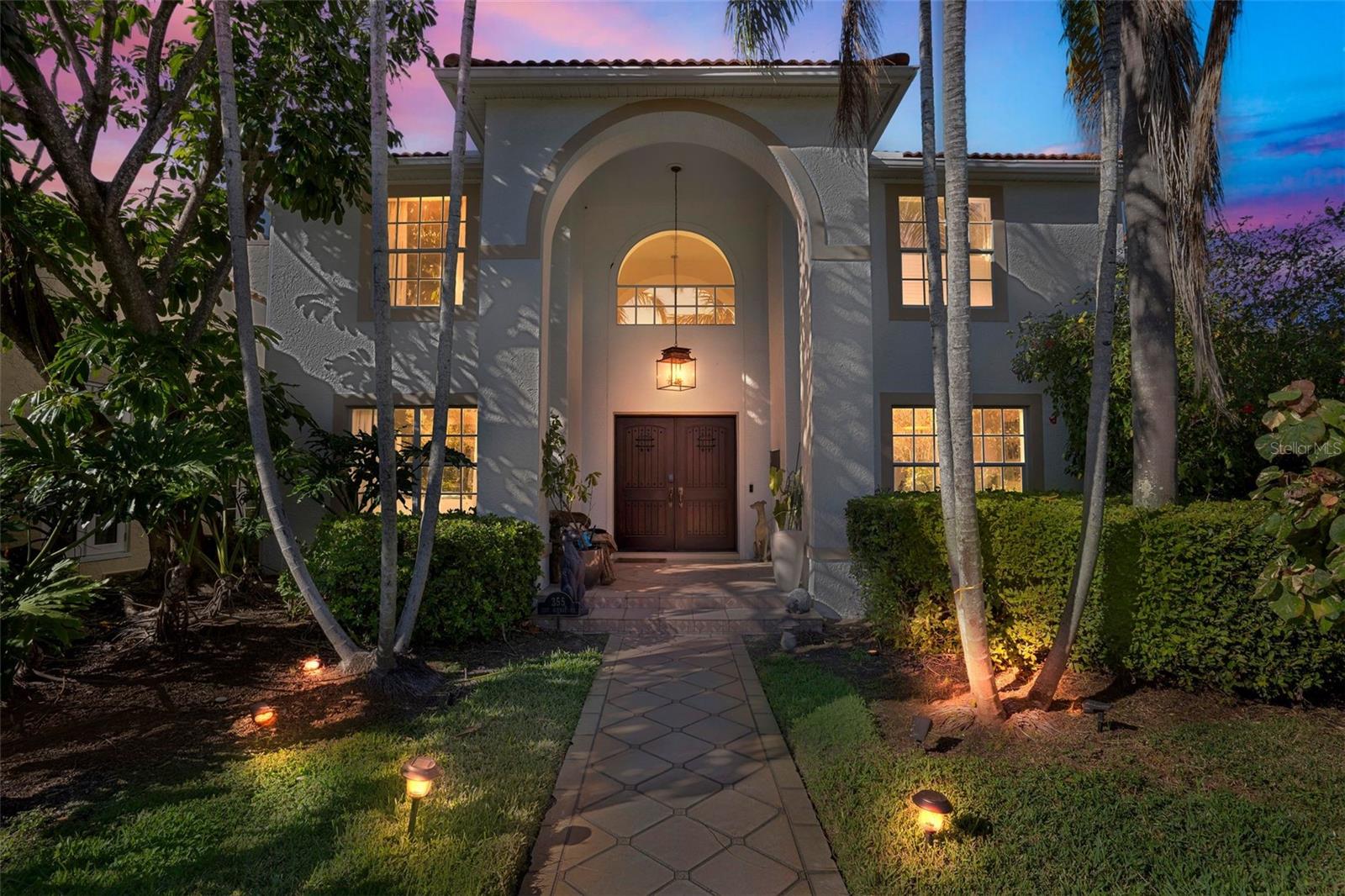 Stunning Two-Story Home with Resort-Style Backyard & Prime St. Pete Location. This home has never flooded & flood insurance incredibly priced at just $635/year. Also there are no HOA fees! Built in 1994, this beautifully updated two-story residence offers nearly 3,000 sq. ft. of refined living space with 4 bedrooms, 3 bathrooms, plus a private Den/Study/Playroom. Move-in ready luxury with nearly every major system upgraded between 2023–2025. The open, inviting floor plan showcases an impressive Great Room with soaring vaulted ceilings, abundant natural light, and a cozy gas fireplace. The space flows seamlessly into a chef’s dream kitchen, fully renovated with luxurious leather granite countertops, natural marble backsplash, high-end stainless steel appliances including double ovens and natural gas cooking, and ample cabinetry. The sunny breakfast room, with French doors to a screened and tiled patio, is perfect for casual dining and entertaining. Step outside to your resort-style backyard—a sparkling pool with heated spa, newly grouted in 2024, surrounded by a travertine-tiled patio, mature landscaping, and full wall enclosure for privacy. A new 400,000 BTU pool heater (2024) ensures year-round swimming and spa enjoyment. The backyard also includes plumbing and natural gas hookups ready for your dream outdoor kitchen, plus luxury XL electric awnings that shade every outdoor living space for comfort and style. Truly an outdoor entertainer’s dream. Multiple living and entertaining areas set this home apart. In addition to the Great Room fireplace, a second bedroom also features its own fireplace, adding warmth and character. The spacious Owner’s suite is thoughtfully positioned for privacy and includes a serene outdoor terrace with electric woven acrylic shades and ceiling fans, custom designer his-and-her walk-in closets, and an oversized spa bath with Jacuzzi tub, dual sinks, separate shower, and water closet. The suite is further enhanced with smart electric blinds, providing effortless control, privacy, and comfort at the touch of a button. Outdoor entertaining reaches new heights with a large rooftop patio above the garage—perfect for hosting gatherings, dining under the stars, or enjoying city views. A tranquil sunroom with a mini-split system overlooks the pool, while the Den/Study is finished with custom French doors, built-ins, and its own dedicated mini-split system for ultimate comfort. Premium Upgrades & Systems: Two high-end Bosch Inverter HVAC systems (installed September 2024 and August 2025) for whisper-quiet performance and energy efficiency. Large high-efficiency gas water heater (installed 2023) with 15-year warrant. New 400,000 BTU pool heater (2024). Luxury XL electric awnings in all outdoor living areas. Custom designer closets for him and her in the Owner’s suite. Smart electric blinds in the Owner’s suite. 6000K daylight-adjustable LED lighting throughout the home. Dedicated mini-split system in the Den/Office for personalized comfort. Home pre-wired for theater with built-in speakers in the Owner’s bath and Den/Office. Located just blocks from the Tampa Bay waterfront and minutes from vibrant Downtown St. Pete’s dining, museums, theaters, and shopping. Enjoy a walkable, bike-friendly lifestyle in a tree-lined neighborhood filled with festivals, cafés, and culture. With low ownership costs, modern luxury finishes, and turnkey upgrades throughout, this home blends elegance, comfort, and convenience like no other.