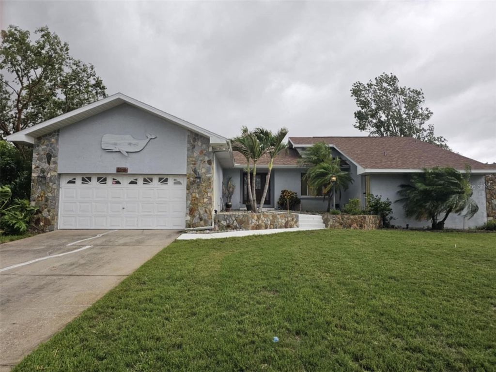Photo of 2210 Bayou Drive, Holiday, FL 34691 (MLS # TB8454342)