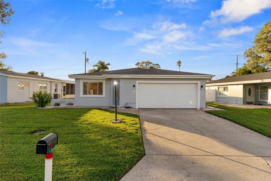 Welcome to this beautifully maintained 3-bedroom, 2-bath home with a spacious 2-car garage, offering comfort, style, and peace of mind.
From the moment you arrive, the home’s freshly painted exterior and clean architectural lines create a warm and sophisticated first impression. Step inside to discover fresh interior paint throughout, creating a light, airy ambiance that’s both welcoming and refined.
Major upgrades provide lasting value, including a brand-new roof (2024) with a transferable 25-year warranty, ensuring years of worry-free living. The electrical panels have been fully replaced, and a whole-house surge protection device has been installed on the main panel for enhanced safety and efficiency. This home sits on a quiet residential street just minutes from some of the area’s finest amenities. Enjoy easy access to the award-winning Gulf beaches, including Madeira Beach and Redington Shores, both less than a 10-minute drive away. The property is also close to top-rated schools, beautiful parks like Lake Seminole Park, and upscale shopping and dining at Seminole City Center. With its prime location, thoughtful updates, and timeless appeal, this property is truly move-in ready and ideal for those seeking a luxurious Florida lifestyle.