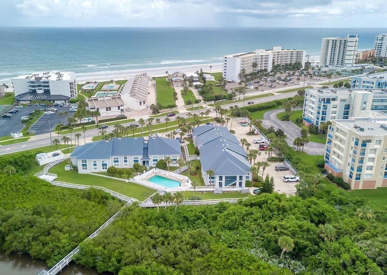 Live the best of both worlds at this beautiful condo! Kiawah Bay 103 rests on the intracoastal waterway where you can enjoy some of the most incredible sunsets or if you're an early bird, walk across the street to the ocean and enjoy the sunrise
This beautiful and recently updated unit has that WOW factor! A Spectacular 1st floor condo that is across the street from the beach. Every inch of this unit has been upgraded with high end finishes. Wood look porcelain tile throughout, stainless steel appliances, stunning granite countertops in kitchen and bathrooms, wood accent wall in living room. The master bedroom comes with a King size bed, walk in closet and an en suite bathroom. The 2nd bedroom has a full bed and large closet. While the kitchen offers a fully stocked, bright and delightful place to make your home cooked meals! Washer and Dryer available in the unit. This vacation getaway will make you feel like home!
Kiawah Bay is situated along the Intracoastal Waterway and set amongst beautiful palm trees. The community offers guest & residents a private Boardwalk with river access where residents can fish or cast off on a kayak or paddleboard and is located just across the street from no drive portion of New Smyrna Beach, enjoy the best of both worlds at Kiawah Bay! Love fishing, kayaking, canoeing, or swimming? You're in luck! This community offers residents direct river access, as well as an excellent dock for fishing. A quick trip across the street takes you to the best, no-driving part of NSB.Not only is Kiawah Bay conveniently located near grocery stores and shopping centers, it's just minutes away from delicious local restaurants! Beach access is walking distance but you will have to walk down to the cross walk, about a 5min walk to the ocean.