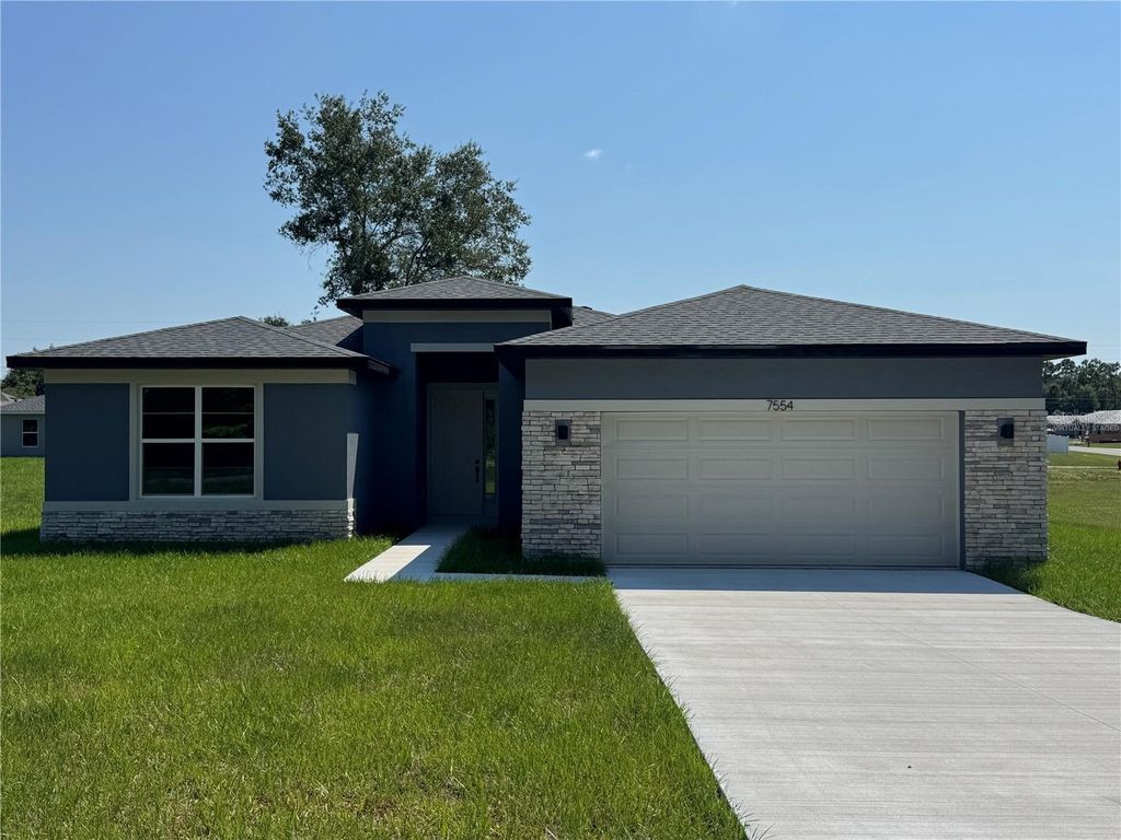 Photo of 7554 SW 129th Place, Ocala, FL 34473 (MLS # OM719211)
