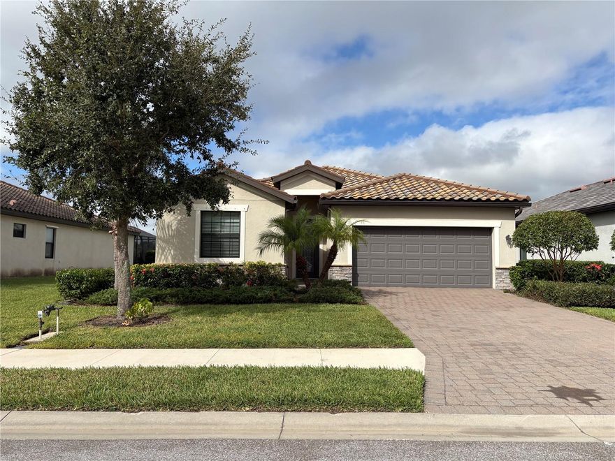 This beautiful 4-bedroom, 3-bathroom home is located in the highly sought-after gated community of Copperlefe. This home is light and bright with an open floor plan that is ideal for families and multigenerational living. The light-filled living area is enhanced by elegant crown molding throughout the main living spaces and the primary suite. The kitchen is both stylish and functional, featuring granite countertops, a large island with seating, pendant lighting, a walk-in pantry, and stainless-steel appliances—perfect for both everyday meals and entertaining. The primary suite offers a private retreat, complete with his-and-her walk-in closets, dual vanities, a luxurious soaking tub, and a fully tiled walk-in shower. Two additional bedrooms share a full bathroom, while a separate guest or in-law suite with its own en-suite bath provides comfort and privacy for visitors or extended family members. Step outside to enjoy a beautifully tiled, screened-in lanai overlooking a tranquil lake—an ideal space for morning coffee or evening refreshments. A two-car garage offers plenty of storage. Lawn and landscaping maintenance are included in the rent. Copperlefe is a well-maintained, gated community featuring a heated community pool and is conveniently located just minutes from I-75, Lakewood Ranch, shopping, dining, and Florida’s stunning Gulf Coast beaches. All tenants are required to participate in the Resident Benefits Package (RBP) for $49.95/month which includes renters insurance, credit building to help boost your credit score with timely rent payments, $1M Identity Protection, HVAC air filter delivery (for applicable properties), move-in concierge service making utility connection and home service setup a breeze during your move-in, our best-in-class resident rewards program, and much more! More details upon application.