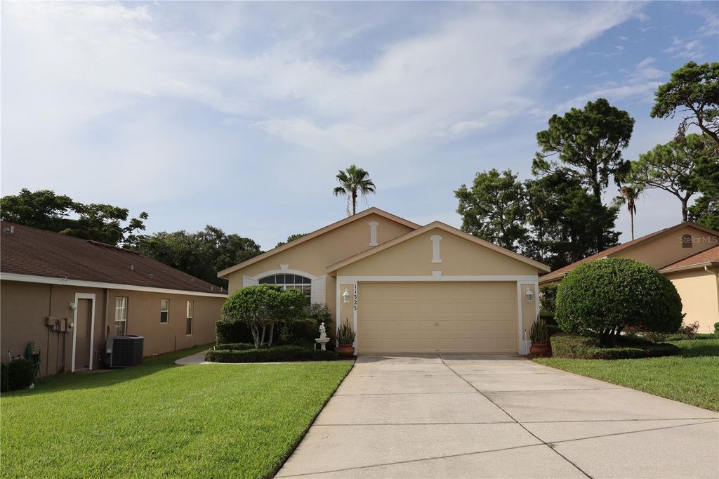 Photo of 11323 Highlander Court, Spring Hill, FL 34609 (MLS # TB8397519)