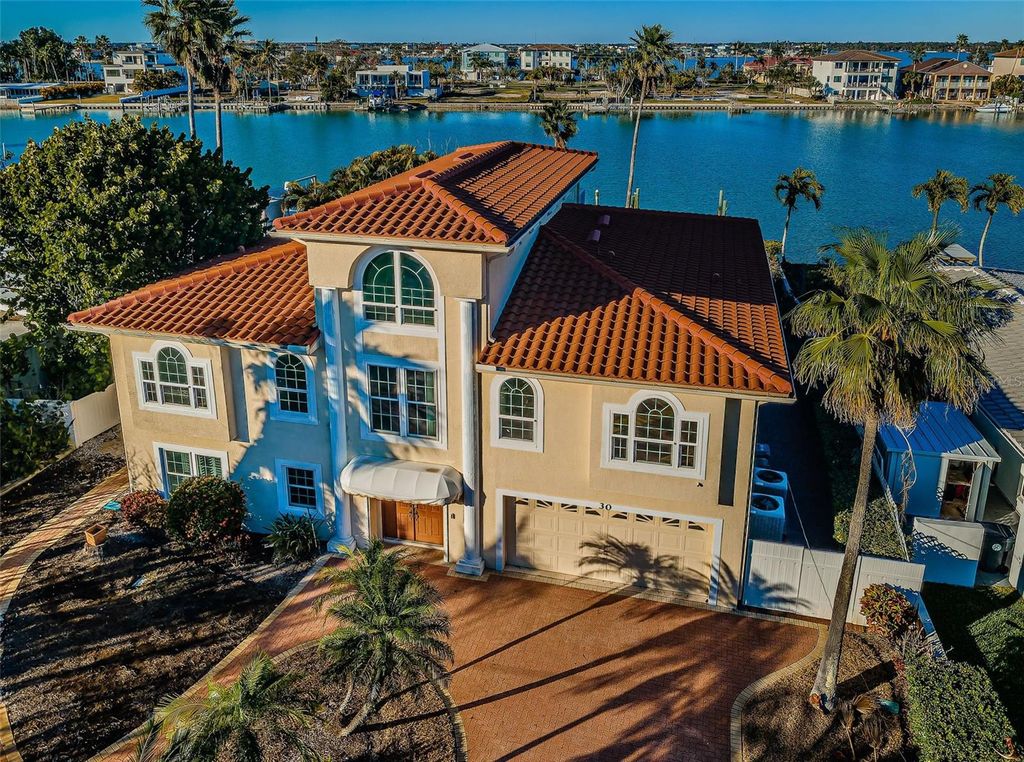 Photo of 30 Dolphin Drive, Treasure Island, FL 33706 (MLS # TB8461841)