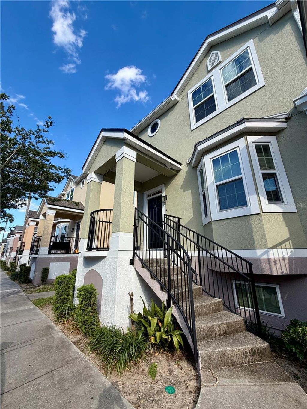 Photo of 6648 Time Square Avenue #105, Orlando, FL 32835 (MLS # O6405645)