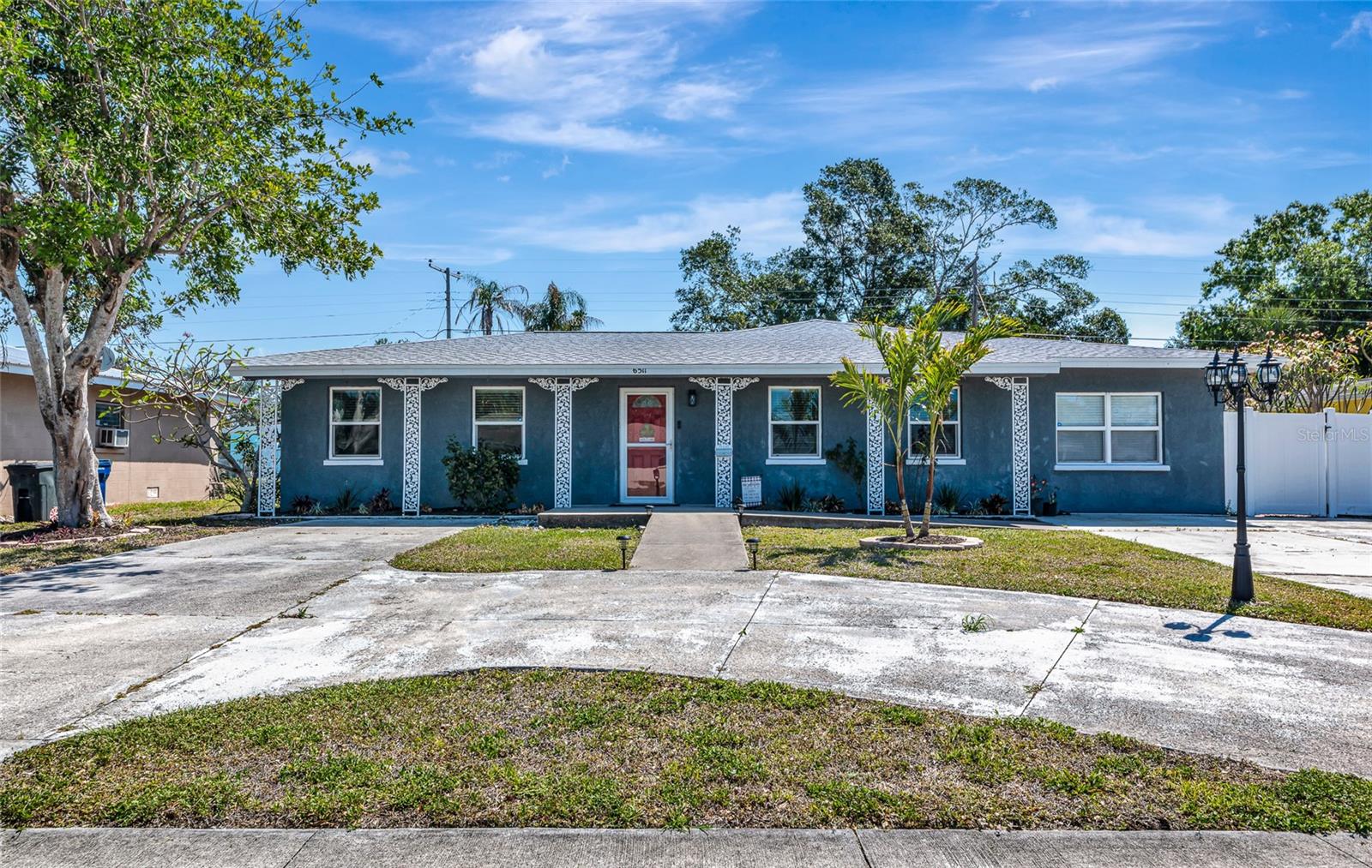 Welcome to your Florida dream home! This spacious and beautifully updated 5-bedroom, 4-bath residence is located in the heart of Bayshore Gardens, just minutes from Sarasota Bay, IMG Academy, beaches, golf courses, shopping, and SRQ Airport (Sarasota).
Inside, you'll find an open and inviting floor plan with new flooring, fresh paint, and updated lighting throughout. The kitchen has been refreshed with stainless steel appliances, updated cabinetry, and countertops, perfect for entertaining or everyday cooking. The bathrooms have been stylishly remodeled, including a spa-inspired primary suite featuring an oversized corner walk-in shower.
Originally expanded in 2009 with a permitted 3 bed / 2 bath addition, this home offers incredible floor plan flexibility — ideal for larger families, multigenerational living, or work-from-home setups. Currently configured with two bedrooms used as office/flex spaces, one as a home gym, and a private guest suite with ensuite bath, there's room for everyone and everything.
Step outside to enjoy the fully fenced backyard, perfect for pets or play, and a large driveway with a pull-through, room for 4+ vehicles or your boat, RV, or other toys!
Other highlights include:
* New roof installed in 2022 * Dual AC units recently serviced and running strong * Large interior utility/laundry room with newer washer/dryer and ample storage * No HOA approval or rental restrictions * No CDD fees * Great rental or Airbnb potential thanks to size and location.
As part of the Bayshore Gardens community, enjoy access to fantastic amenities with low HOA fees included in annual taxes. Residents benefit from a junior Olympic-size pool, a rentable recreation hall, pickleball and basketball courts, and a marina with boat slips up to 40'available at just $4/foot/month (includes water and electric).
No hurricane damage. No flooding issues. Just a solid, updated, and centrally located home — move-in ready and full of potential.
