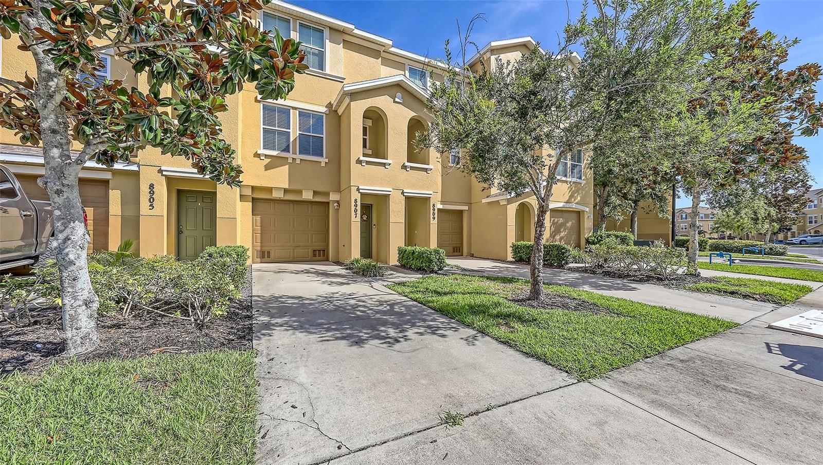 Fantastic townhouse. Located in Lakewood Ranch this 2BR/2.5BA offers beautiful luxury vinyl and tile throughout. Open kitchen with Corian, wood cabinets, Stainless appliances, island with electric and pantry closet. The refrigerator is only 1 year old. A/C is also a year old, and the roof was replaced 2 years ago, which is an association expense. The Lanai off dining area overlooks beautiful greenery and even a peek a boo view of the pond. Balcony off primary bedroom, which has 3 closets. Hurricane rated windows. This is a 2-car tandem garage. The Maintenance fee includes basic cable, water, sewer, community pool, exterior maintenance, landscaping, and private roads. No CDD in this is a gated section at the end of Town Center Parkway, which equates to very little traffic and nice privacy. Close to I-75, UTC mall, Pop Stoke, Mote Marine aquarium, SRQ airport, restaurants and shopping and all of Lakewood Ranch amenities.