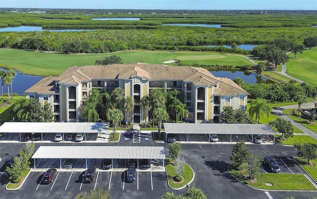 Photo of 7121 River Hammock Drive #303, Bradenton, FL 34212 (MLS # A4665633)