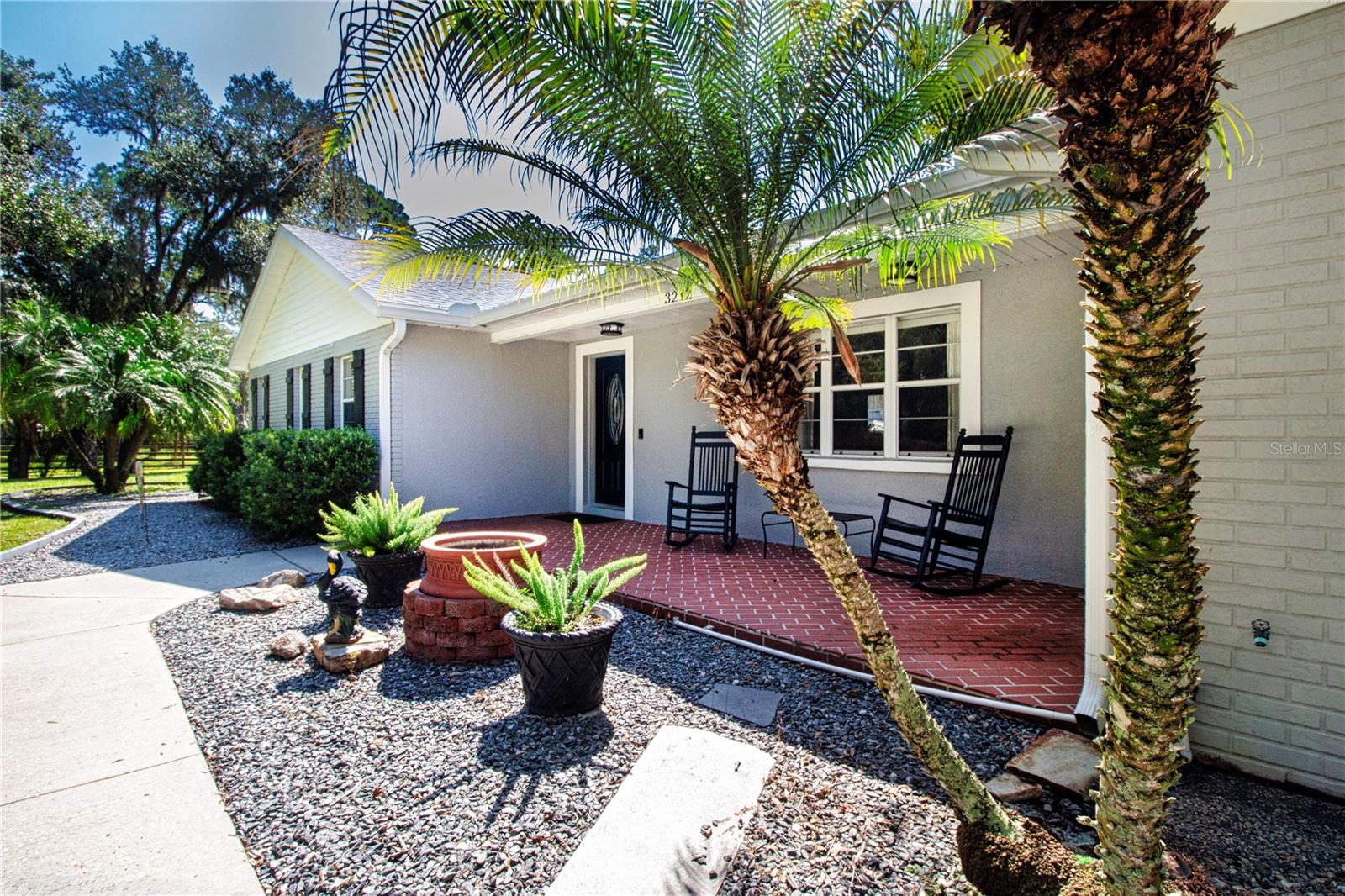 Discover serene living in this approximately 2,000 square foot heated residence, featuring four bedrooms, two bathrooms, a two-car garage, and an enclosed lanai. The property also includes a substantial 40x23 barn or workshop situated on 1.9 acres within the highly desirable Sundance boating and equestrian community.
This meticulously maintained home features custom kitchen cabinetry, granite countertops, updated laminate flooring, and six-inch baseboards, complemented by a fireplace that enhances comfort during the winter months.
The kitchen benefits from abundant natural light through windows that provide views of the expansive, well-maintained backyard and an abundance of wildlife. A formal living room is included, in addition to a versatile bonus room suitable for use as a playroom or game room. The enclosed covered lanai offers an ideal space for entertaining guests or relaxing in comfort. The yard is landscaped and maintained, featuring mature plants and a pathway leading to a large pole barn with a tack room for additional storage. Roof is only 6 years new and the AC is 2022.
The Sundance community is located in southern Hillsborough County, featuring exclusive access to a private marina equipped with electricity and running water. This area serves as an ideal venue for both community gatherings and private events. Residents enjoy 2 special events each year organized by the HOA and community volunteers, where residents are able to spend time with one another and meet great neighbors. There is a convenient boat launching directly on the Little Manatee River, providing swift access to the bay. Additionally, the community offers stables with entry to extensive trail riding opportunities within Little Manatee State Park.
This community features a low HOA and is located approximately 45 minutes from the Gulf beaches and 15 minutes from I-75 and the tri-county areas. It is also minutes from highways 41 and 301, and close to shopping centers, hospitals, charter schools, and other amenities. Private showings are available by appointment.