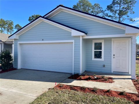 Photo of 18 Flagstick Lane, Bunnell, FL 32110 (MLS # FC314896)