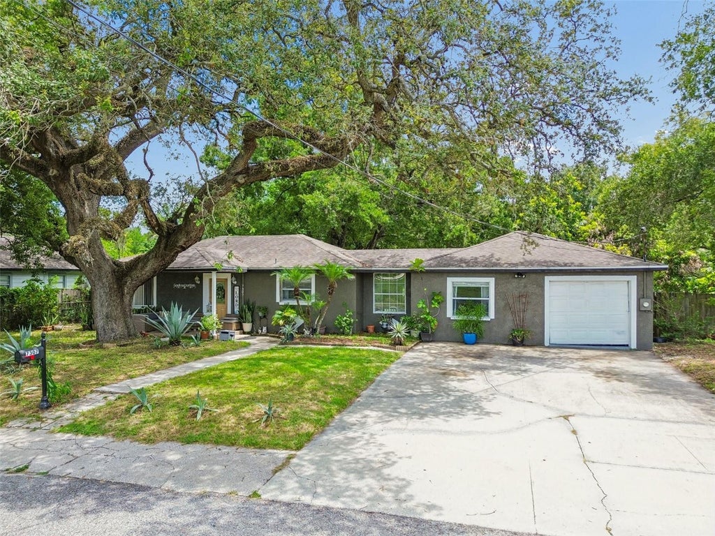 Photo of 7307 N Huntley Avenue, Tampa, FL 33604 (MLS # TB8538161)
