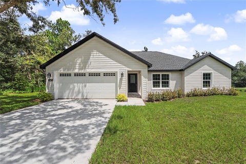 Photo of 18471 SW 66 Loop, Dunnellon, FL 34432 (MLS # OM719611)