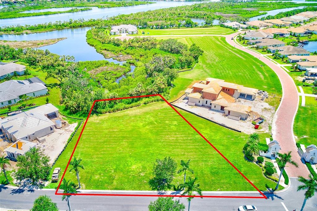 Photo of 11709 Rive Isle Run, Parrish, FL 34219 (MLS # TB8405736)