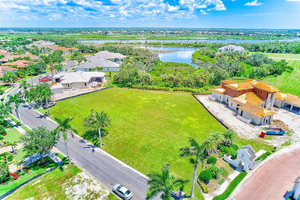 Photo of 11709 Rive Isle Run, Parrish, FL 34219 (MLS # TB8405736)