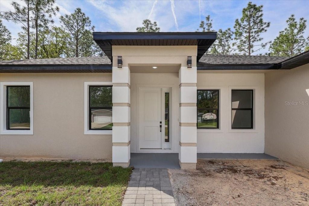 Photo of 8681 N Circular Way, Citrus Springs, FL 34434 (MLS # O6399306)