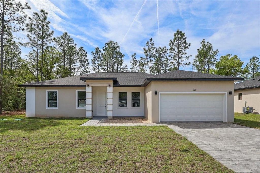 Photo of 8681 N Circular Way, Citrus Springs, FL 34434 (MLS # O6399306)
