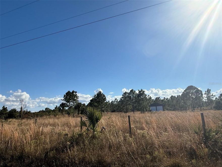 Welcome to this beautiful 1.25-acre parcel located in the desirable Viking/Prairie area of Okeechobee! This spacious vacant lot has already been cleared, giving you a head start on creating your ideal setup—whether you're planning a weekend retreat, agricultural use, or future homesite. The property is fenced on three sides, offering added privacy, definition, and security.  Enjoy the freedom and wide-open space this growing area provides, with plenty of room for animals, toys, and outdoor living. No HOA and flexible zoning make this a perfect opportunity for those seeking land with potential. This parcel is currently fenced together with the neighboring lot, but the owners are selling only 1.25 acres. Access to the property is through the neighboring lot, and a gate/culvert will need to be installed on the sold portion for entry after purchase. A stake marks the division between the two lots in front of the fence. There’s a two-car garage on the property that will be removed before closing.