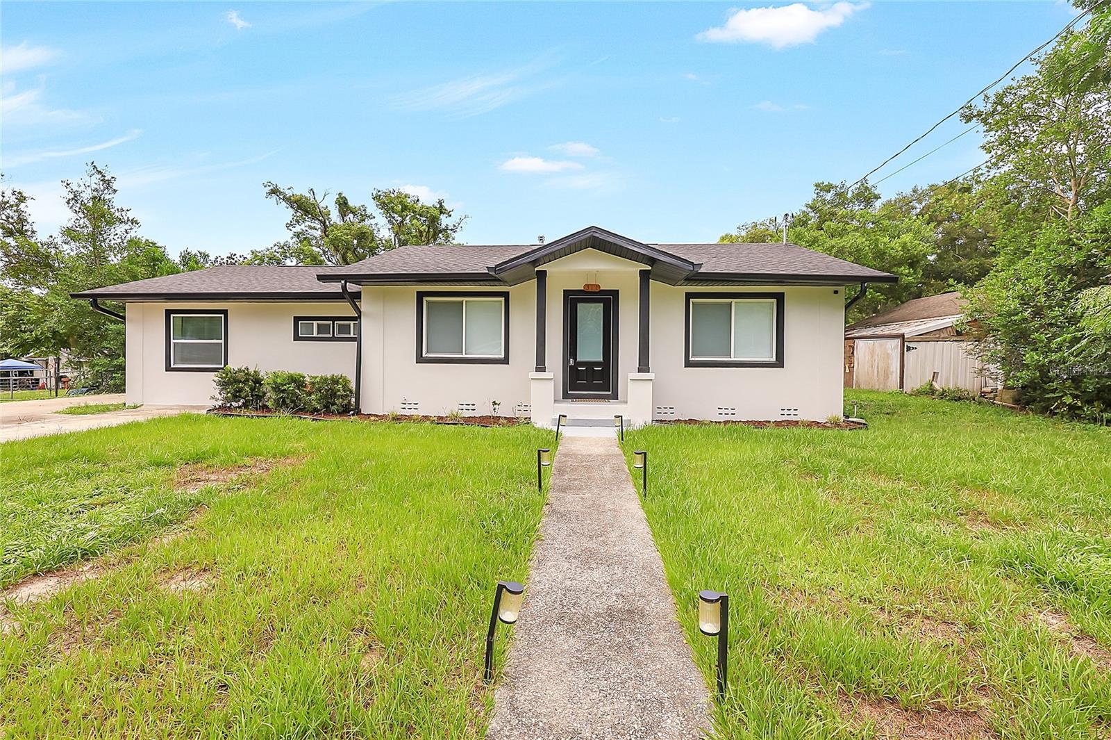 Welcome to this beautifully updated 3-bedroom, 2-bath home perfectly situated in the heart of DeLand. Featuring a desirable split floor plan, this home offers both comfort and functionality. Step inside to find tile and vinyl plank flooring throughout, adding style and durability to every room.
The open kitchen is a standout with granite countertops, stainless steel appliances, a breakfast bar, and ample cabinet space—perfect for everyday living and entertaining. Just off the kitchen, a spacious laundry room with built-in cabinets adds convenience (washer and dryer not included).
Enjoy seamless flow from the living room into the dining area, enhanced by fresh fixtures throughout the home. The large backyard offers room to play, garden, or relax, and includes a rear-access driveway leading to a storage shed—ideal for tools or equipment.
Additional updates include resurfaced exterior finishes and modern lighting throughout.
Don’t miss this move-in-ready gem in a prime location close to shopping, dining, and all that DeLand has to offer!