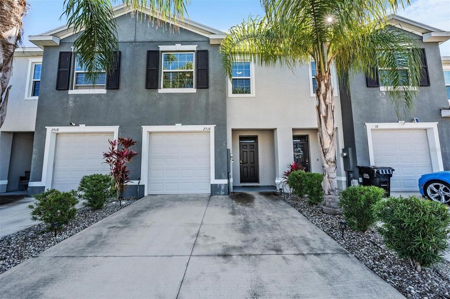 MOVE-IN READY 3BR TOWNHOME BUILT IN 2020 | SCREENED PATIO | ODESSA, FLORIDA | Welcome to 2914 Suncoast Blend Drive, a beautifully maintained 3-bedroom, 2.5-bathroom townhome with a 1-car garage located in the desirable South Branch Preserve community in Odessa. Built in 2020, this two-story home offers 1,673 square feet of thoughtfully designed living space with an open and functional layout ideal for everyday living. The main level features a welcoming entryway that opens to a spacious dining area and an open-concept kitchen and family room. The kitchen is equipped with granite countertops, white cabinetry, subway tile backsplash, black appliances, and a large center island with seating—perfect for casual meals or entertaining. The living area provides plenty of space for gathering and includes sliding glass doors that lead to a covered and screened lanai overlooking a private patio area. Upstairs, all three bedrooms are privately situated along with the conveniently located laundry room. The primary suite offers a walk-in closet and an en-suite bathroom with dual sinks and a walk-in shower. Two additional bedrooms share a full bathroom and provide flexible space for family, guests, or a home office. This home includes an attached one-car garage with additional storage. The Preserve is a well-maintained community with clubhouse, large resort style pool, playgrounds, dog park, and so much more.  Convenient access to the Suncoast/Veterans Parkway, new shopping, dining, and everyday amenities, as well as top rated local schools and healthcare facilities make this move-in-ready townhome an excellent opportunity for your primary residence, seasonal home, or investment property.