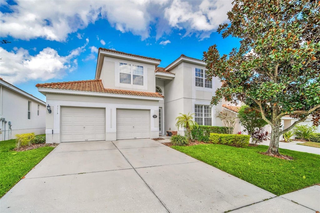 Photo of 7745 Teascone Boulevard, Kissimmee, FL 34747 (MLS # O6443150)