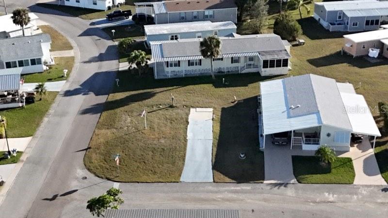 The Seller has improved the price and is ready to Negotiate! Don't pass on this opportunity this could be just the place you want to have your new home delivered! Nice size corner lot can accommodate a Double -Wide. Prior Park approval is required with Non-Refundable application fee. Please visit the Holiday Park website for all park information.