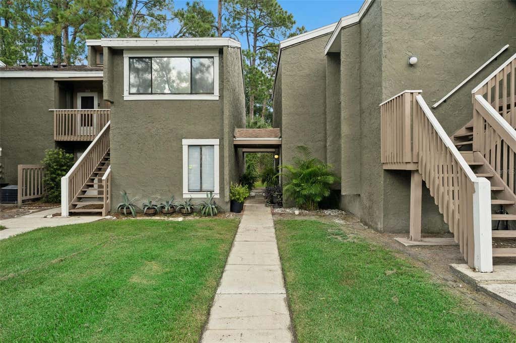 Photo of 6168 Peregrine Avenue #12B, Orlando, FL 32819 (MLS # O6433277)