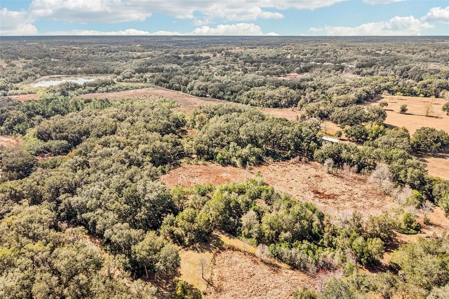 5.81 acres of vacant land. Edwards Road is just off US 441/27. Edwards Road starts out asphalt then turns to dirt. You know those dirt roads are not traveled as much. Privacy! Off the dirt road portion you will find Harris Lake Road and it becomes even more private. Imagine your home surrounded by land and nobody to see unless you go see them. Maybe this will be your retreat. Come see your next land purchase for whatever your desire.