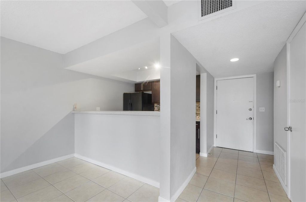 Photo of 5957 Windhover Drive #C03, Orlando, FL 32819 (MLS # O6351855)