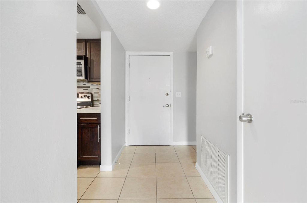 Photo of 5957 Windhover Drive #C03, Orlando, FL 32819 (MLS # O6351855)