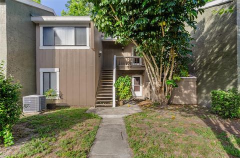 Photo of 5957 Windhover Drive #C03, Orlando, FL 32819 (MLS # O6351855)