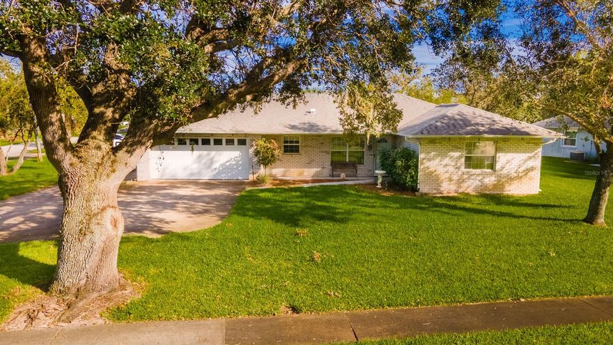 A MUST SEE this lovely 2 bedroom/2 bath home is situated on a quiet corner lot in Florida Shores. This home was well-maintained and cared for by the original owner. Home stayed high and dry during the recent storms. The home features a nice open floor plan with the living room area, kitchen, and dining room area all adjoined making for easy entertaining. Both bedrooms are sizeable with the master bedroom featuring a walk-in closet, master bath, and a secondary closet. In-house laundry room with washer, dryer, and separate wash tub included. Enjoy the Florida evenings relaxing on the screened in back porch area overlooking the neighboring retention pond. There is plenty of parking space with a 2 car garage and an additional RV/trailer parking area. NO HOA. Perfect place for the first time home buyer or retiree. Great location for recreation such as walking and biking and just a short drive away from I-95, shopping, local parks, fishing, boat ramps and the beaches. All information to be verified by Buyer, measurements are approximate. ;Water: City