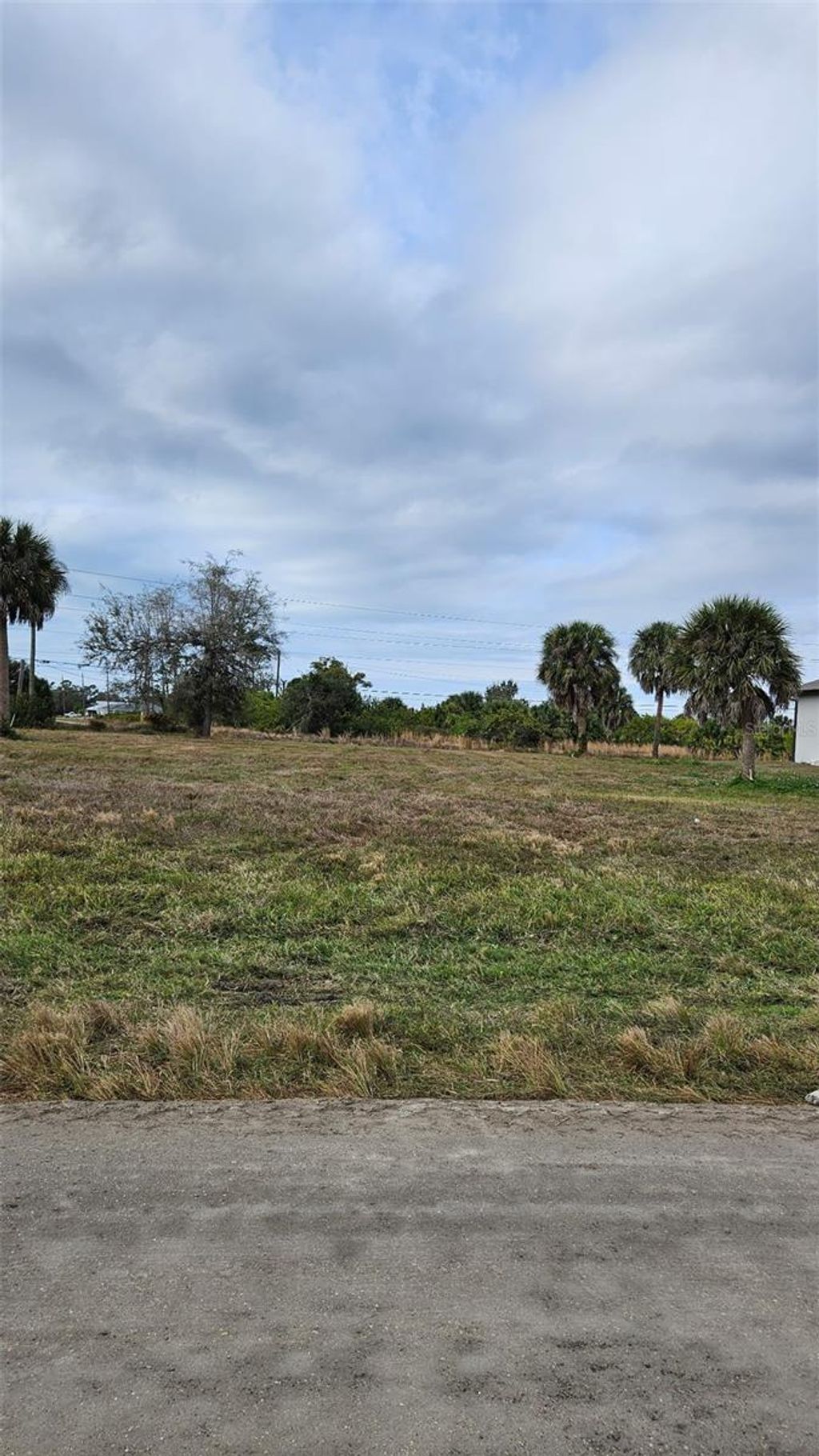 Photo of 279 Boundary Boulevard, Rotonda West, FL 33947 (MLS # D6145641)