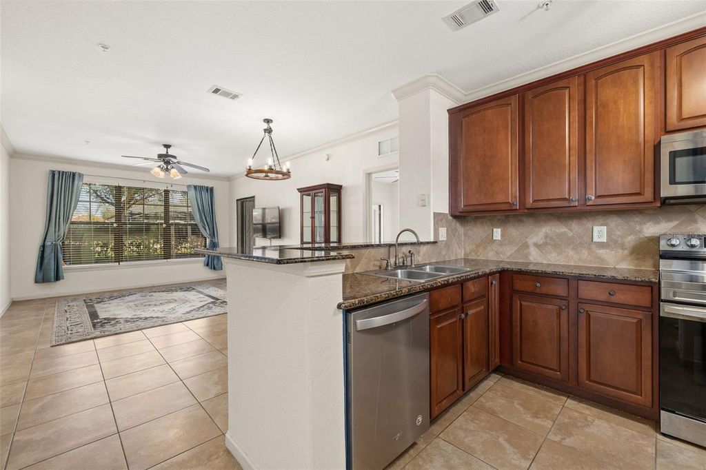 Photo of 901 Charo Parkway #716, Davenport, FL 33897 (MLS # O6386061)