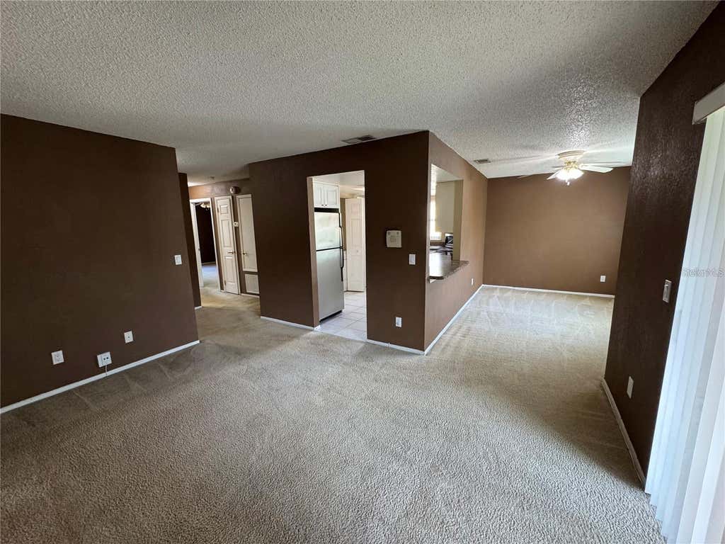 Photo of 9907 Barley Club Drive #3, Orlando, FL 32837 (MLS # O6431778)
