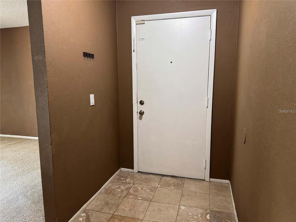 Photo of 9907 Barley Club Drive #3, Orlando, FL 32837 (MLS # O6431778)