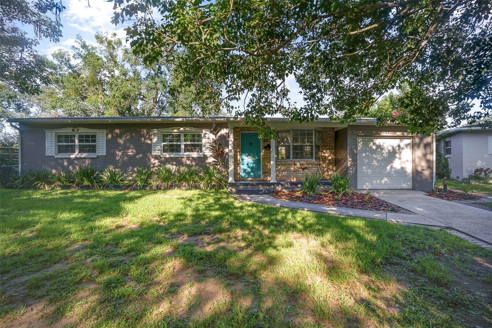 YOU WON'T FIND ANOTHER DEAL LIKE THIS! This 1,851 sq. ft. mid-century modern home sits on land that was once an orange grove and offers 4 bedrooms, 2 bathrooms, and a 1-car garage on a quarter-acre lot with mature trees, flowering plants, and fruit trees. The property also features a finished 165 sq. ft. backyard studio with a loft, air conditioning, and electricity, ideal for a creative workspace or potential Airbnb income opportunity along with the spacious primary suite.
The home showcases original terrazzo floors, ceramic tile in the den, and wood-look vinyl in the primary bedroom. Major updates include a new A/C system in 2016, roof in 2017, double-pane windows (excluding bay window) in 2017, gutters in 2020, and a complete re-wiring with upgraded electrical panel in 2020/2021. Renovations in 2021 brought a remodeled den with exposed brick, open shelving, and wood ceiling beams, an updated bathroom with subway tile and gold fixtures, and a new kitchen with stainless steel appliances, shaker cabinets, farmhouse sink, and quartz countertops.
Ample storage can be found throughout, including large closets, a cedar-lined window seat, and built-in hallway cupboards. The home is zoned for Lake Como K-8 and Boone High School, located on a quiet street with no cut-through traffic, and within walking distance to Lake Underhill Park. Conveniently situated near the Hourglass District, downtown Orlando, Baldwin Park, Audubon Park, and Orlando International Airport, with easy access to the 408 and I-4, this property offers both charm and location.