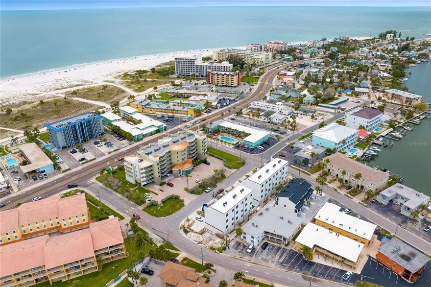 One or more photo(s) has been virtually staged. NOW COMPLETE WITH CERTIFICATE OF OCCUPANCY IMMINENT! FLOOD-ZONE ELEVATED construction with LUXURY FINISHES. ZONED FOR NIGHTLY + WEEKLY RENTALS VRBO & Airbnb LEGAL.  PET-FRIENDLY Two pets allowed, no weight limits. ROOFTOP DECKS with GULF VIEWS, wet bars & hot tub reinforcement
Capri Townhomes - The Ultimate Beachside Investment + Lifestyle Opportunity
Introducing Capri Townhomes, a boutique enclave of just seven stunning 5-bedroom, 4-bath luxury townhome-style condos, each designed to elevate your coastal living experience. With nearly 2,800 square feet of well-thought-out living space, private rooftop decks, oversized 2+ car garages, and a community pool, this exclusive development truly offers it all - and it's just steps away from the pristine sands of Treasure Island and iconic John's Pass Village.
Whether you're seeking a primary residence, a savvy second home, or a short-term rental powerhouse, Capri delivers the rare combination of full flexibility, luxury, and legal rental freedom on the Gulf Beaches. Few properties in this market offer true short-term rental eligibility without restriction, and even fewer with this level of design and quality. Third party projections show annual revenue around $200K. Please check with your accountant about Cost Segregation studies for depreciation. Perfect for 1031 exchanges. 
Each unit has been crafted with modern coastal living in mind - from remote-work-friendly floor plans to rooftop entertaining spaces that bring the Florida sunset to your doorstep.