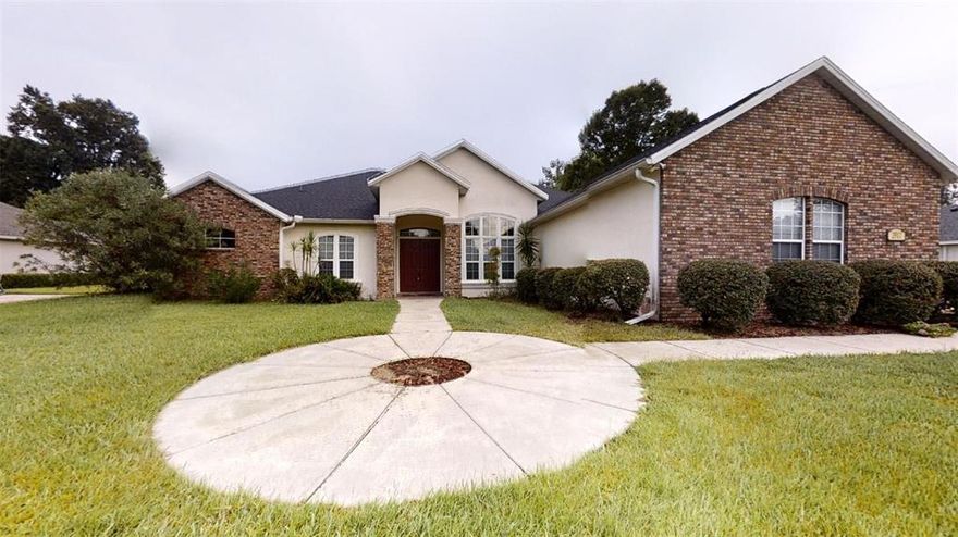 Beautiful brick home in Elegant Laurel Woods, gated community.   Laurel Woods is one of Ocala's nicest maintained Gated communities in the city.   This home is Grand and Large.   From the minute your in the driveway, you'll see a stunning home with a 3 car side garage.  Go inside you see  high vaulted ceilings.   This home is inviting to a large family with 5 Bedrooms and 4 bathrooms, separate Living Room and Family Room, formal dining, and breakfast nook.  Kitchen will need some appliance, but its a very large kitchen with wood cabinets and Corian countertops.  Master Suite is Grand with a place for a sitting area.   Shower and tub combo with double sinks.  There are 2 rooms on one side and 3 rooms on the other side.   5th Bedroom could be multi-use, for office or craft room.   A pool awaits you in the back of the home.  Brand New Screens on the Cage and a Brand New Roof.   Please look at the 2d Tour and the Matterport 3d Tour.  All pictures are current.   A few updates with some cosmetics and this home will be like brand new.   AL Milton was the builder of this Fine Custom Home.
