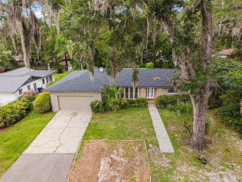 Photo of 930 NW 37th Terrace, Gainesville, FL 32605 (MLS # GC541066)