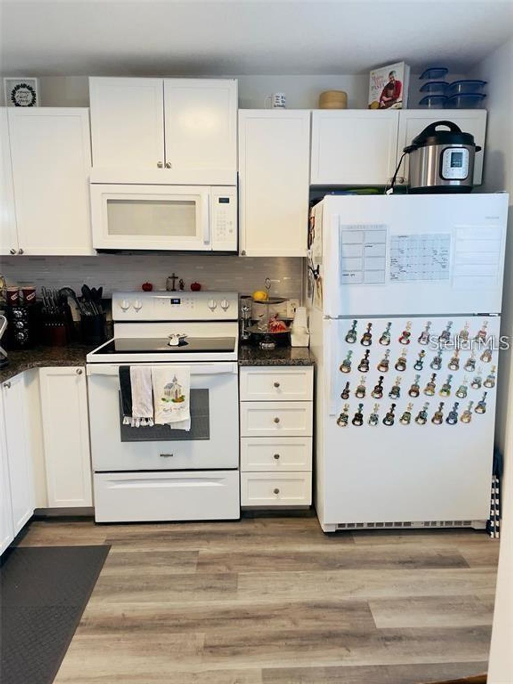 Photo of 2500 Woodgate Boulevard #203, Orlando, FL 32822 (MLS # O6385919)