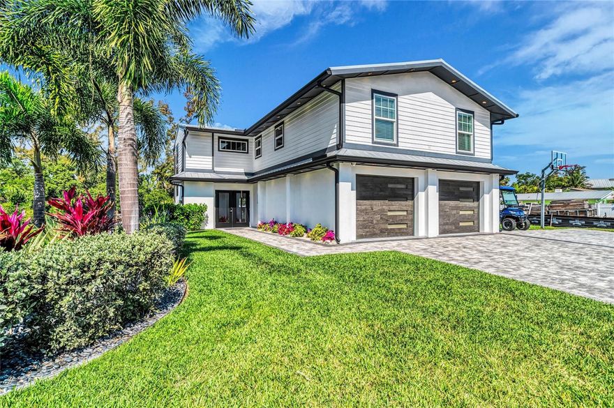 Fully Renovated in Coveted Longbeach Village, This Waterfront Retreat Captures the Rare Charm of Old Longboat Key with the Polished Ease of Like-New Coastal Living...Positioned on a Saltwater Canal with a New Seawall, New Dock with Trex Decking, 8,000-Lb Boat Lift, Dual PWC Accommodations, Dock Lighting, Electrical, and Water, This Home is Designed for the Boating Lifestyle without Sacrificing Style, Comfort, or Convenience...Inside, the Residence Showcases Light-Filled Interiors, a Dramatic Floating Staircase, Ceramic Tile Flooring, Designer Finishes, and an Effortless Indoor-Outdoor Flow Made for Relaxed Island Living...the First Floor Features a Newly Added True Fourth Bedroom, a Sleek Entertaining Bar with Built-In Draft Beer System, and Open Living Spaces that Connect Beautifully to the Private Outdoor Setting...Upstairs, the Gourmet Kitchen Offers Built-In Appliances, Quartz Countertops, Soft-Close Drawers, Undercabinet Lighting, Wall Oven, Cooktop with Externally Vent Hood, a Large Island with Basin Sink, and Generous Storage...Outdoors, the Saltwater Pool and Spa, Premium Landscaping, Extensive Landscape Lighting, ClearView No-See-Um Screening, Covered Terrace, and Canal Views Create a Private Resort-Style Escape for Everyday Living and Effortless Entertaining...Ownership Has Been Thoughtfully Strengthened with New Impact Windows and Doors, a Newer Roof, Updated Dockside Infrastructure, Enhanced Energy Efficiency, and Refined Interior and Exterior Improvements Throughout...Set in One of Longboat Key’s Most Beloved Coastal Enclaves, the Property is Moments from Mar Vista, Shore, Whitney’s, Iconic Nearby Sandbars, Sarasota Bay, White Sand Gulf Beaches, and Open Water Just Beyond the Canal...Offered Fully Renovated and Thoughtfully Finished, This is a Rare Opportunity to Own a Substantially Enhanced Waterfront Home in Longbeach Village...Book Your Private Tour Today and Live a Fuller Life on Longboat Key.