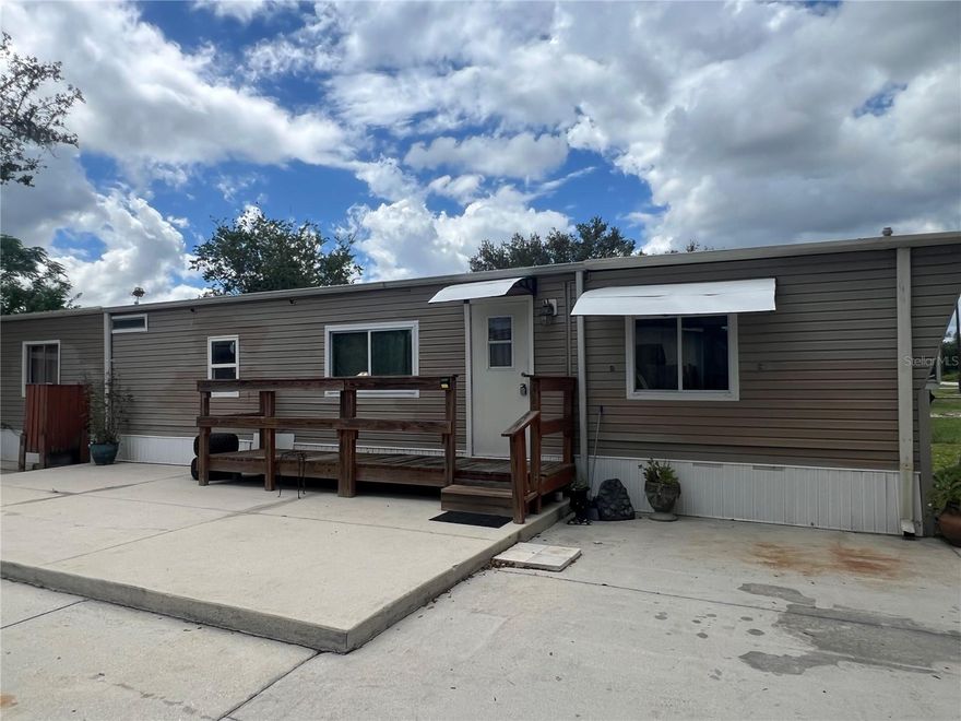 Looking for an affordable and low-maintenance property? This efficient 2 bedroom, 1 bath singlewide mobile home is a perfect fit for one person or a couple seeking a budget-friendly home or investment property.

Inside, you'll find a spacious primary bedroom and a smaller second room—ideal as a guest room, office, or storage. The home features a durable metal roof and central A/C, ensuring comfort and peace of mind.

Situated on a manageable lot, the property includes two additional outbuildings:

An 8x10 metal storage shed for tools and outdoor equipment.

A larger multi-room building equipped with electric and plumbing. While not currently set up for residential use, it offers great potential for workshop space, hobby rooms, or additional storage. Buyer to verify suitability and perform all necessary inspections.

This is a great opportunity to own a functional, affordable property with bonus space and minimal upkeep. Don't miss your chance—schedule your showing today!
