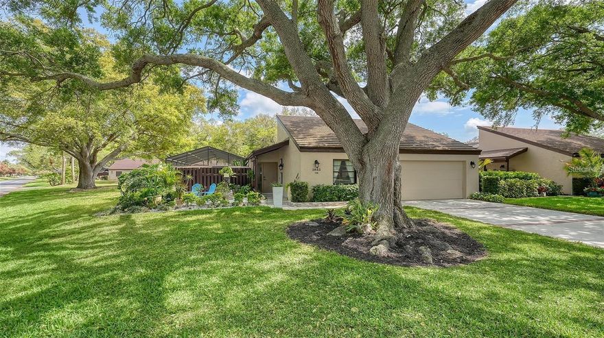 Welcome to Sarasota's esteemed Glen Oaks Manor community, one of the area's most charming, tree-lined neighborhoods and this enviable, beautifully renovated end-unit villa offering serene views of majestic oak trees. This home presents a rare opportunity to enjoy a true indoor-outdoor lifestyle in a peaceful, park-like setting. The residence features an open-plan layout with contemporary tile flooring throughout, complemented by an updated kitchen with sleek granite countertops, stainless steel appliances, and a sun-drenched garden atrium that fills the space with natural light. Glass sliders invite you to a private courtyard pool with amazing open views with space for outdoor seating and dining, perfect for relaxing or entertaining. The home offers two bedrooms with a thoughtfully designed split-plan layout, ensuring privacy for both residents and guests. The spacious owner's suite includes a walk-in closet and en-suite bathroom, while the guest bedroom enjoys tranquil views of the front oak trees and lush lawn. Bathrooms feature updated tile and vanity consoles.
Upgraded features include recessed lighting, wood molding and accents, multiple inviting living areas, with the comfort of a new A/C system. The front entrance courtyard showcases travertine tile, enhanced landscaping, and ambient night lighting. An oversized two-car garage provides additional storage and attic access, with an extended driveway to host guests with ease of parking. Glen Oaks Manor is a dog-friendly community offering walking trails, a gazebo, ponds, and mature landscaping beneath canopied oak trees that elevate the neighborhood's allure. Conveniently located just minutes from downtown Sarasota, and close to beaches, restaurants, and shopping. This home offers the perfect blend of comfort, nature, and location. Whether you're lounging by your private pool or exploring the culture and lifestyle for which Sarasota is known, don't miss the opportunity to call this exceptional property "Home".