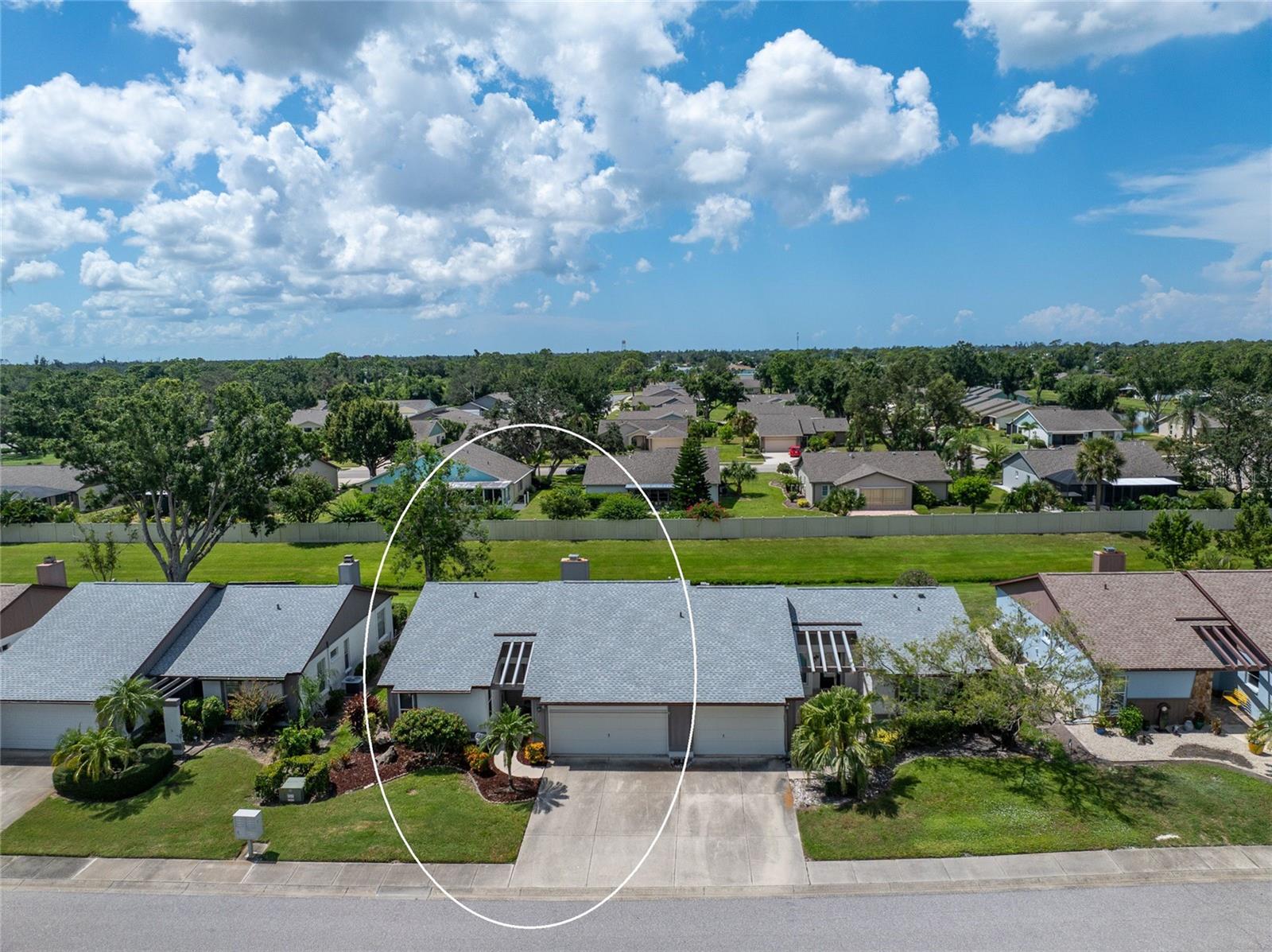 Experience the ease of maintenance-free living in the friendly 55+ golf cart friendly community of Foxwood, where this move-in-ready two bedroom, two bath attached villa is waiting for you. Set in an X flood zone with impact windows and lush tropical landscaping, this home offers peaceful rear greenbelt views. Inside, the great room features vaulted ceilings and a cozy fireplace, creating a bright and welcoming space, while the kitchen offers tile flooring, plenty of cabinetry with pull-out shelves, Corian countertops, a tile backsplash, and a reach-in pantry. The open layout connects the eat-in kitchen to the great room, and the air conditioned Florida room has been opened to provide even more living space with large windows and French doors leading to the patio. The master suite includes a walk-in closet and an ensuite bath with a fully tiled walk-in shower, while the guest bedroom offers a roomy reach-in closet and the guest bath features a tub and shower combination. Start your mornings with coffee on the open-air back patio or your afternoons with a glass of wine and a good book. Crown molding in the main living areas, kitchen, and primary bedroom add a touch of luxury to the interior. Foxwood offers an impressive array of amenities designed for both relaxation and recreation, including tennis courts, shuffleboard, a sparkling pool, spa, and a clubhouse that hosts a variety of activities and social events throughout the year. The association takes care of the details so you can focus on enjoying life, covering lawn care, irrigation, reserves, exterior painting, roof maintenance, pool and spa upkeep, shuffleboard and tennis facilities, bocce ball, clubhouse maintenance, private roads, lake care, cable, exterior pest control, and more. Beyond the gates, you are just minutes from championship golf courses, pristine Gulf beaches, and Historic Dearborn Street, where you can enjoy charming shops, local dining, a weekly farmer’s market, and live entertainmentSchedule your showing today at 533 Foxwood Blvd and discover the relaxed lifestyle you’ve been looking for.