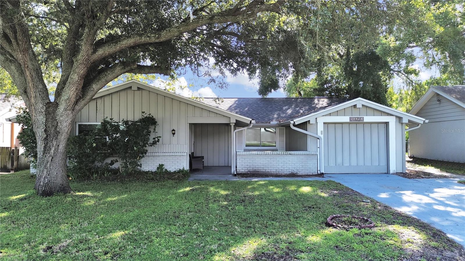Located in Beacon Woods golf community. this 2 bedroom with bonus room, 2 baths, 1 car garage, screened pool home, fenced yard on a cul-de-sac. A/C 2017. NEW Impact windows, gutters and spouts replaced 2024, sprinkler system 2 years ago, outside lights, new roof 3 years ago. open dining, living and kitchen area. Additional bonus room leading to the back porch overlooking the pool area. custom designed open Kitchen with breakfast bar, pantry, granite countertops, tile backsplash, accent lighting, lots of counter space. Pass through window from kitchen to enclosed porch. Home Includes Refrigerator, Range, Dishwasher, Washer and Dryer. Master bedroom overlooks the pool through large ceiling to floor window and bathroom with walk in closet. tiled walk in shower, vanity, fixtures, lighting and toilet. Guest bath has Tub/shower. Glass enclosed porch leads to fenced back yard. screened pool (plumbed for heater) with brick coping and open screened patio space. Community swimming pool, tennis courts, recreational facility. banking, shopping, restaurants close by. About 45 minutes drive to Tampa International Airport.