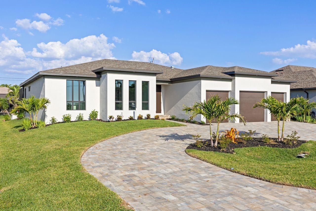 Brand New! 4 bedroom, 2 bath pool home with 3 car garage. Gourmet kitchen, laundry inside. Swimming pool with cage and outdoor built in grill area. Easy access to Cape Corals vibrant array of amenities, pristine beaches, championship golf courses and lively entertainment. Rent includes lawn and pool maintenance.
