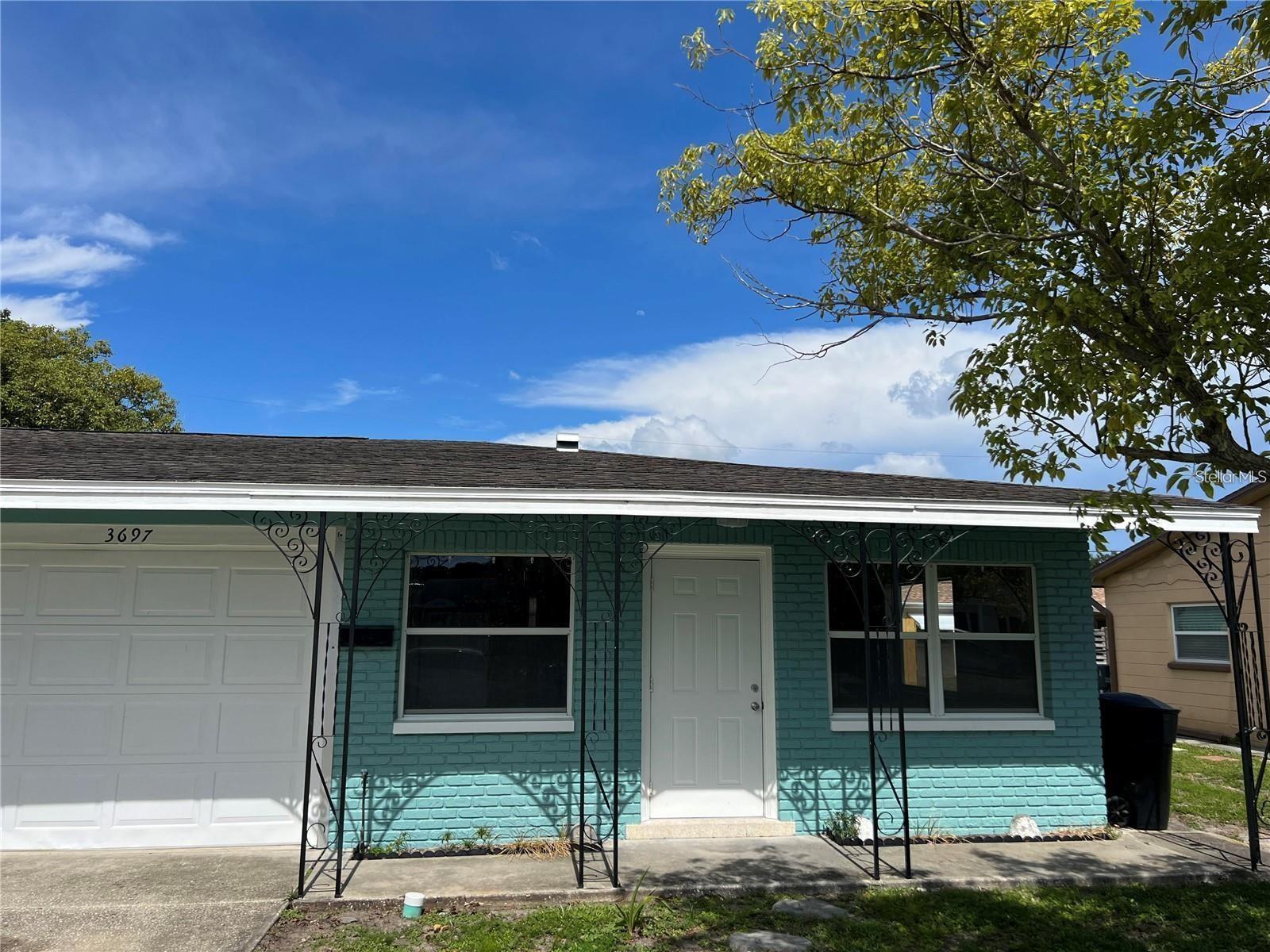 Welcome to this 1 Bed, 1 Bath duplex located centrally to the Beaches and Downtown St Petersburg. Enjoy the spacious living room with updated vinyl flooring, while also having a dinning area to fit a nice size table. This duplex comes with a 1 car garage that extends back with a storage room, and a laundry room with washer and dryer hook ups. Exit out the back to your private, newly fenced in yard. Call today for your own private showing!