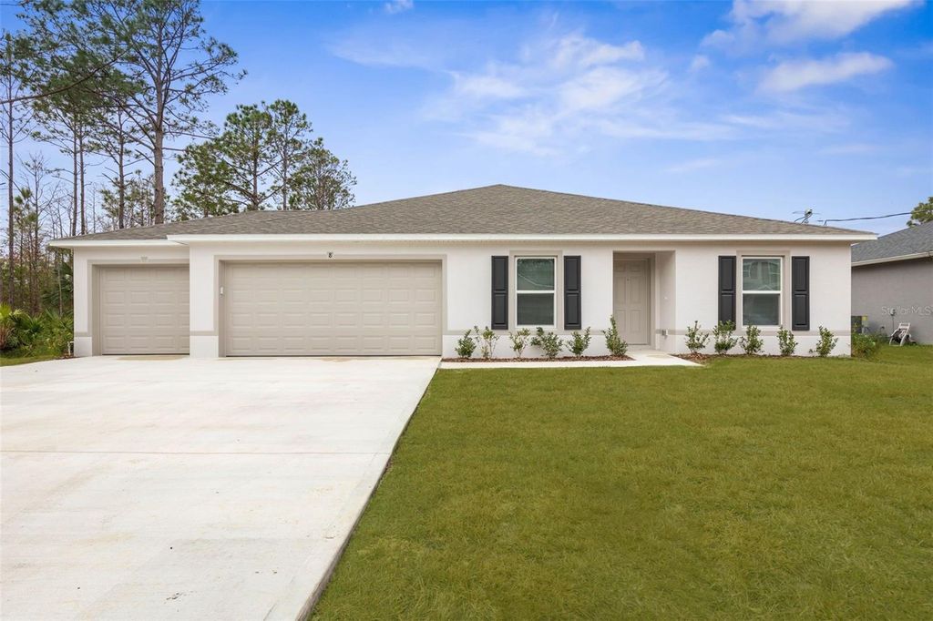 Photo of 8 Sedgefield Path N, Palm Coast, FL 32164 (MLS # FC317251)